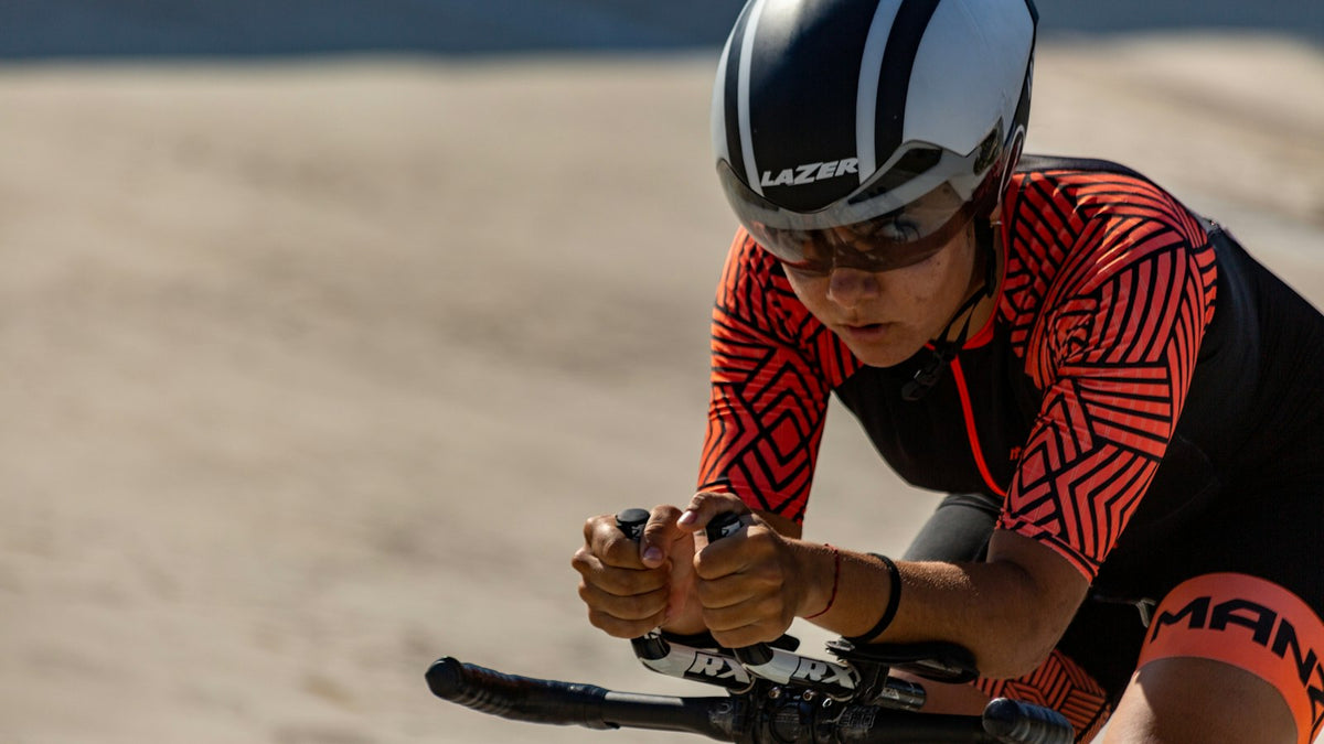 Cyclist wearing a helmet while riding